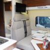 espace tv repas table Vans fourgon aménagé 3 places - EVAGO Location camping car